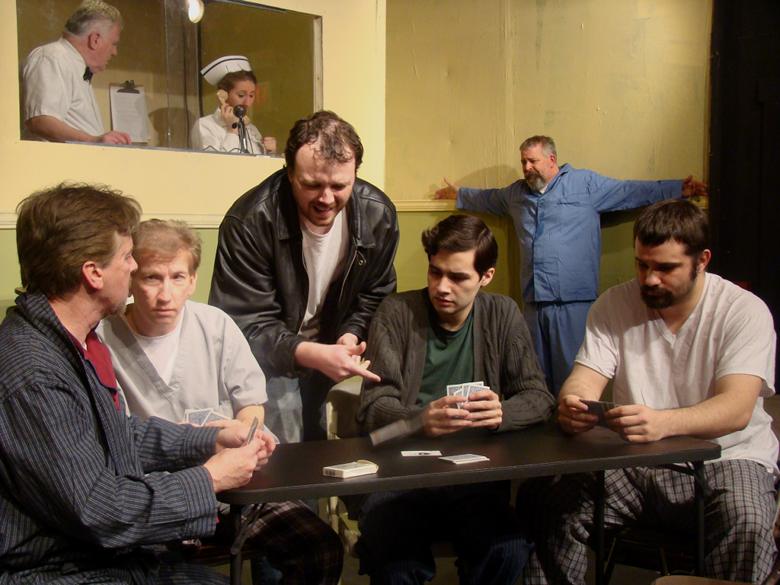 R.P. McMurphy leads a card game with his asylum mates in Stageloft's production of "One Flew Over the Cuckoo's Nest."